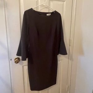 Beautiful Calvin Klein dress, size 8, color is a dark grey, EUC